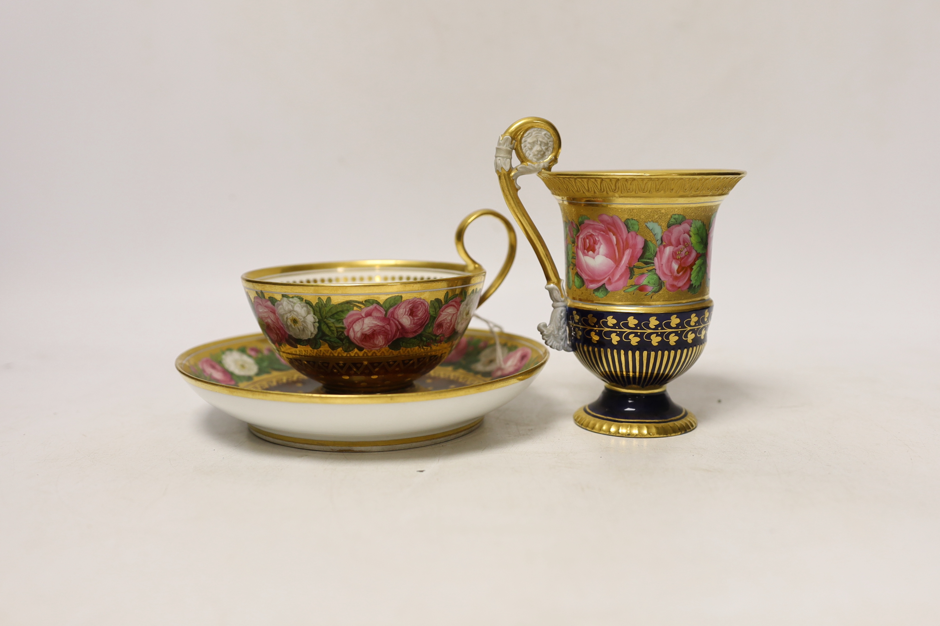 A 19th century Meissen cabinet cup and a Sevres teacup and saucer